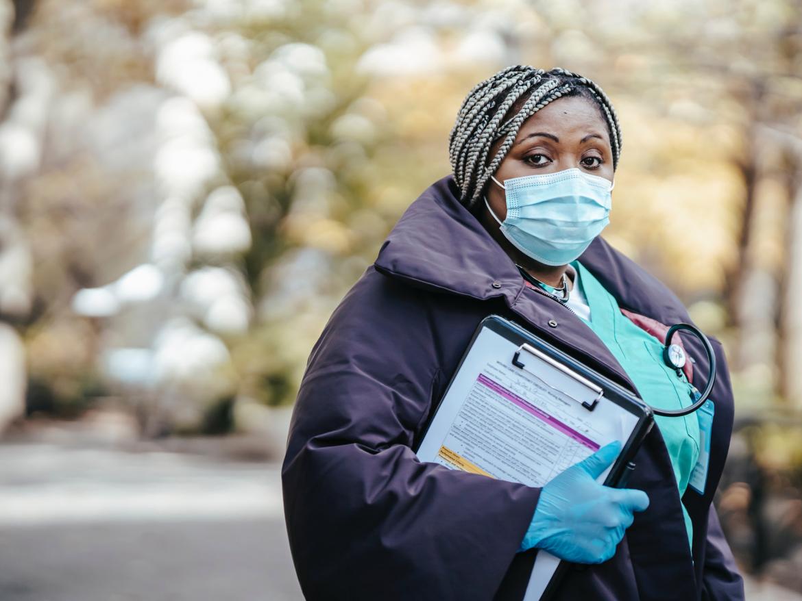 Nurse at outdoor intake center during COVID-19 pandemic
