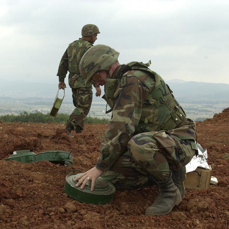 Soldiers removing landmines. 