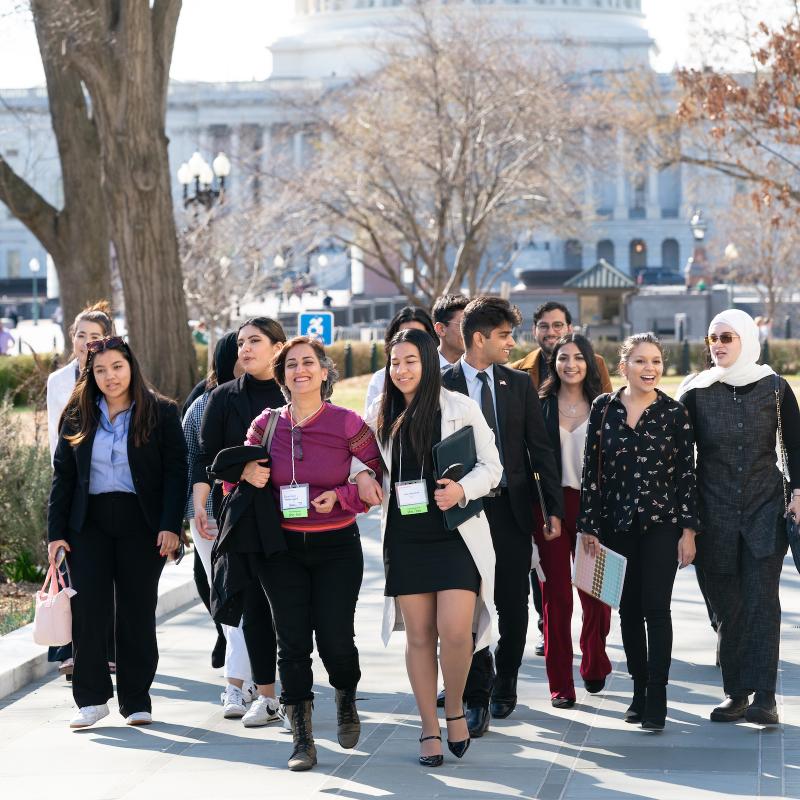 Advocates walk in group front of U.S. Capitol 