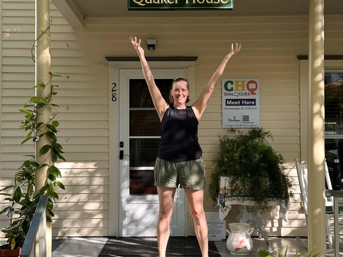 Alicia McBride in front of Quaker House in Chautauqua