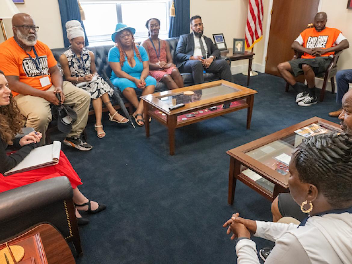 Participants in the 2024 Violence Interrupter Symposium meeting with Congressional staff